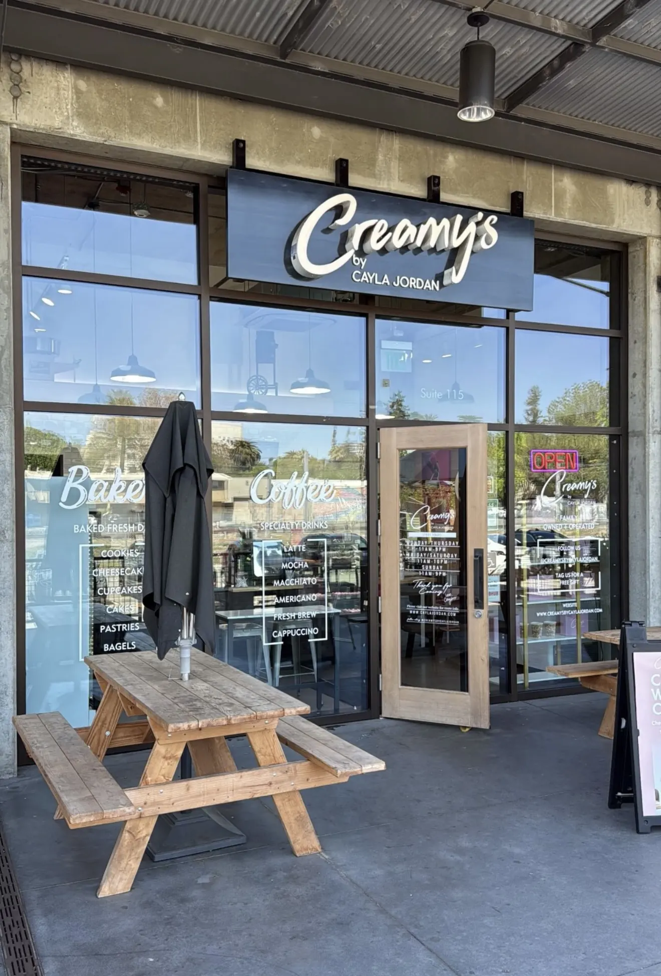 Clean storefront windows and entry door at a Sacramento coffee and bakery shop