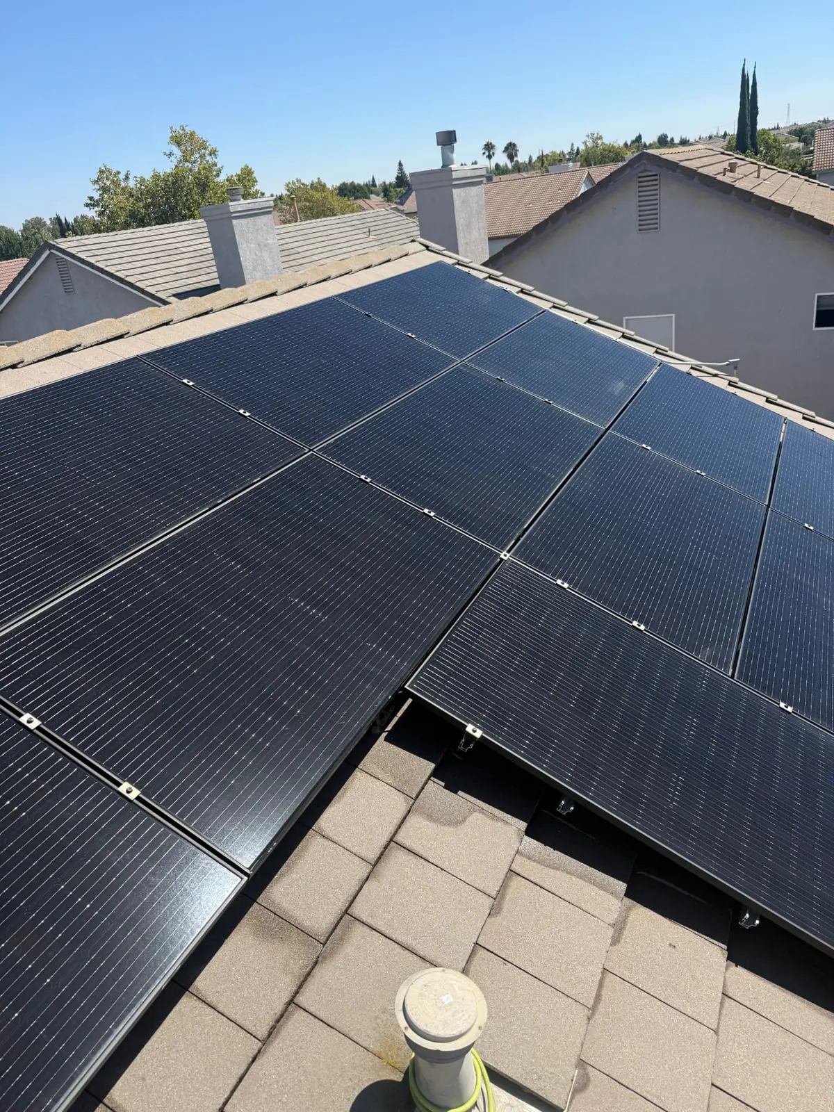 Rooftop solar panel array serviced by CSG in Sacramento, California