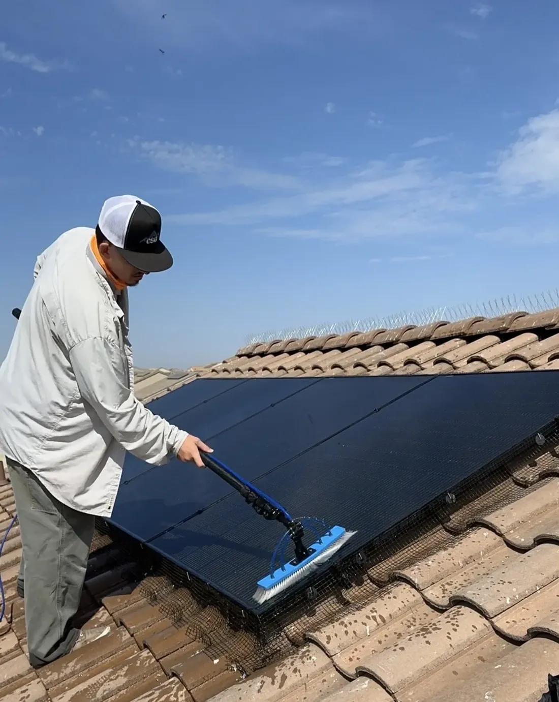 Solar Panel Cleaning being performed by a CSG technician